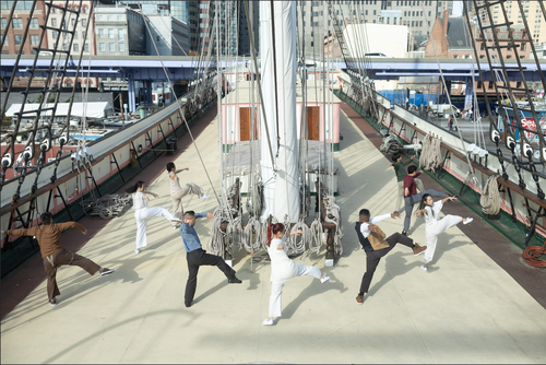 Dancers move in unison on the deck of the tall ship Wavertree at South Street Seaport Museum.