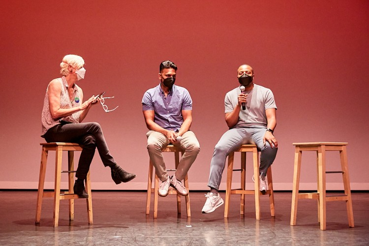 Panelists Antuan Byers, Lucy Sexton & Pavan Thimmaiah are captured engagingly talking to each other during the Dance/NYC DWR Initiative Launch Event. The panel includes a moderator and two artists.