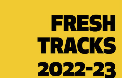 yellow background with black lettering reading "Fresh Tracks 2022-23"