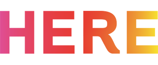 Gradient pink, orange, and yellow letters on white background spelling out HERE. 