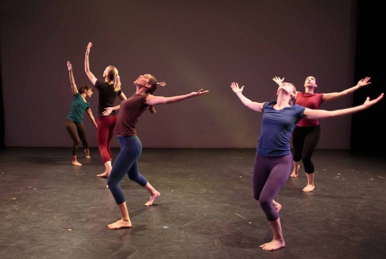 Five dancers performing