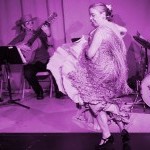 Aurora Reyes dancing with Flamenco Latino at 2016 home-based season, tinted magenta hue