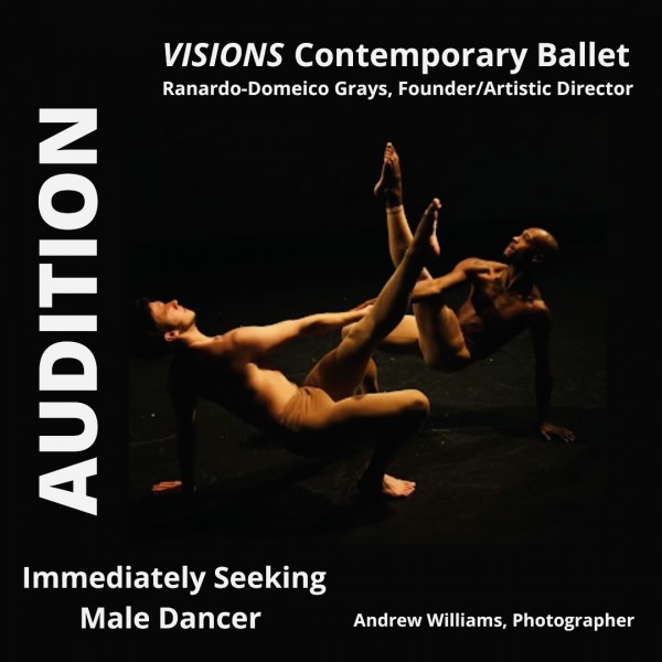 Two men in flesh color tights right hands clasp, left legs extended up, left hands touching the floor, low level focus is up.   