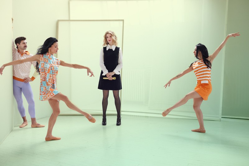 Tom Gold Dance artists Brian Gephart, Cara Seymour, and Emily Cardea (right) pose with Olivia Chindamo.