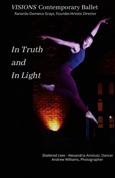 Dancer is leaping high facing side with leg in parallel passe position and bottom leg extended,.