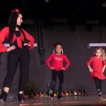 Two young dancers with their Assistant Teacher during our 2018 Youth Program Holiday Showcase.