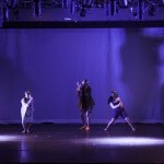 Photo of Dis-Configure. Features 5 dancers on stage wearing sequined masked from the Emerging Choreographer Series
