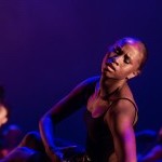 Woman dancer with head tilted slightly back, three-quarter facing viewer