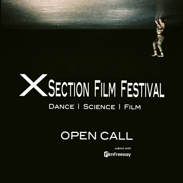 Xsection Film Festival Open Call. A dancer upside down in a headstand against a black background.
