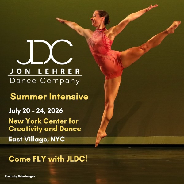 Dancer jumping with staright legs and reaching arms