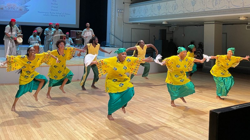 A company photo of Maimouna Keita African Dance Company performing.
