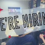 Large text in a transparent white bubble reads "WE'RE HIRING" surrounded by three red stars of various sizes. There is a video l