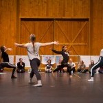 Group of four dance educators performing example of choreography to group