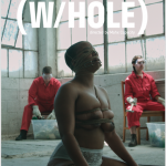 A black femme kneels on the floor topless. Her face and chest are bound in rope. Two white femmes in red sit in chairs.  