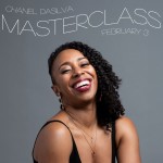 Headshot of a Black woman against a grey background with a big smile and her head tilted slightly back. She wears loose black le