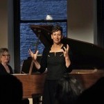 A participant sings with a piano accompanist in a class at the Balance Arts Center