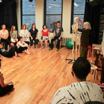 Ann Rodiger teaching anatomy to a group of students at the Balance Arts Center