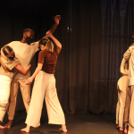 3 dancers create a shape stage left and 2 dancers stand facing away stage right during a Performance at the BAC