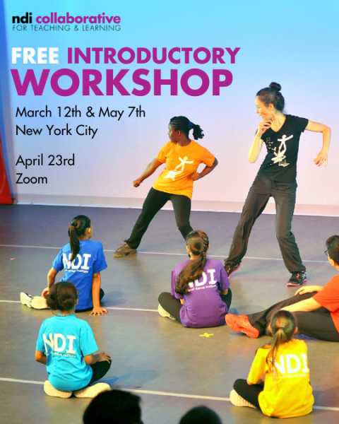 A teacher and a student dancing together in front of a group of students