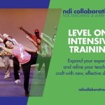 A teacher leans and reaches her arm.