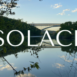 A photograph of the Henry Hudson Bridge seen from Inwood Hill Park on a summer evening, with white text reading "SOLACE."