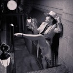 Ballerina on pointe and sitting