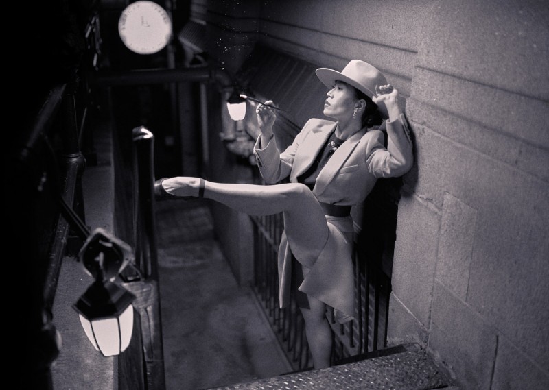 Ballerina on pointe and sitting