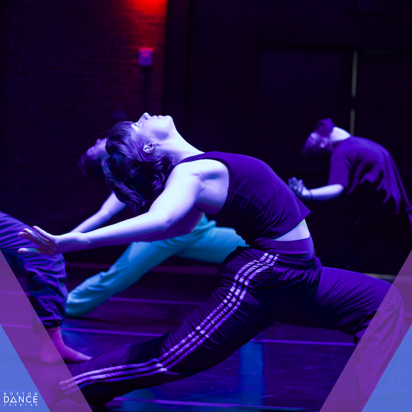 Dancer in a deep lunge and back bend facing profile to the camera with hues of blue and purple.