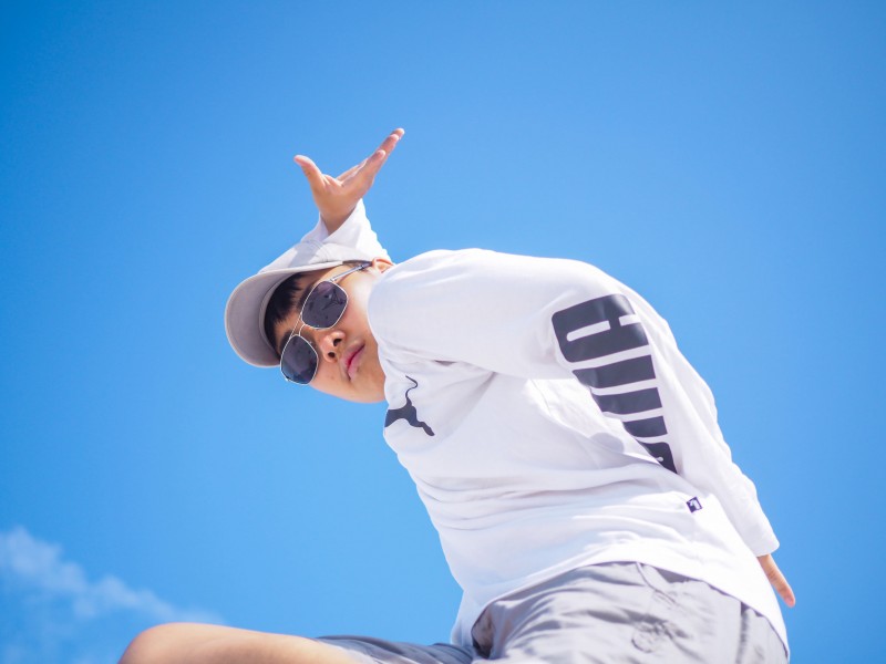 Shannon in white shirt doing dance move