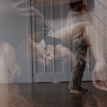 Two images overlaid - one woman laying on the ground and one man standing with hand touching face.