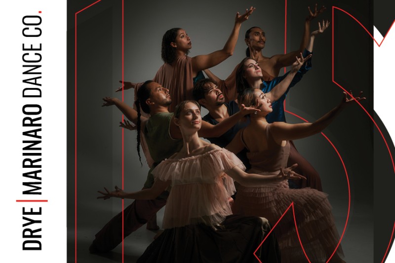 7 Dancers with arms up looking to the sky