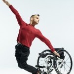 a picture of JanpiStar, balancing in front of their wheelchair