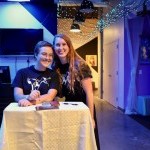 Two team members wearing Two Can Do t-shirts at the 2019 Gala