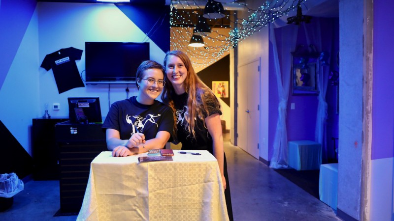 Two team members wearing Two Can Do t-shirts at the 2019 Gala