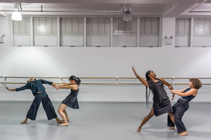 Four dancers performing a work-in-progress at a SharedSpace informal showing