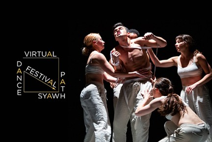 A man in the center being wrapped in white elastic surrounded by 4 other dancers.