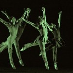 Lim&oacute;n Dancers jumping with their arms up