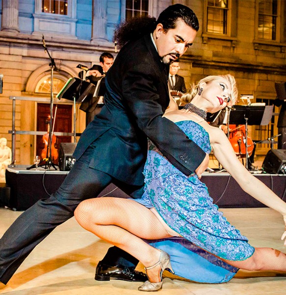 Tango dance couple in a low lunge