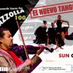 Violinist with dancers in long black skirts in the background and an open bandoneon 