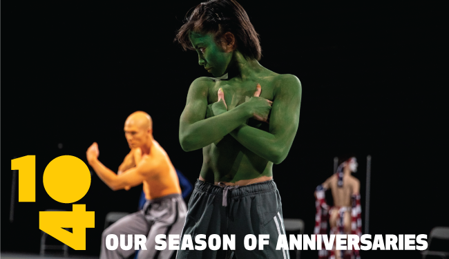 Various performers topless covered different color paint, dancing. 