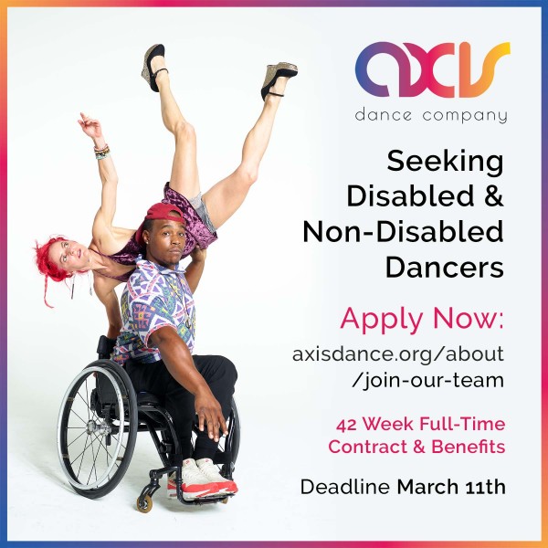 A dancer sits in his wheelchair and lifts another dancer upside down over his shoulder, text application described above. 