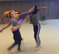 Dancers practicing partnering work during a Physical Listening LAB.