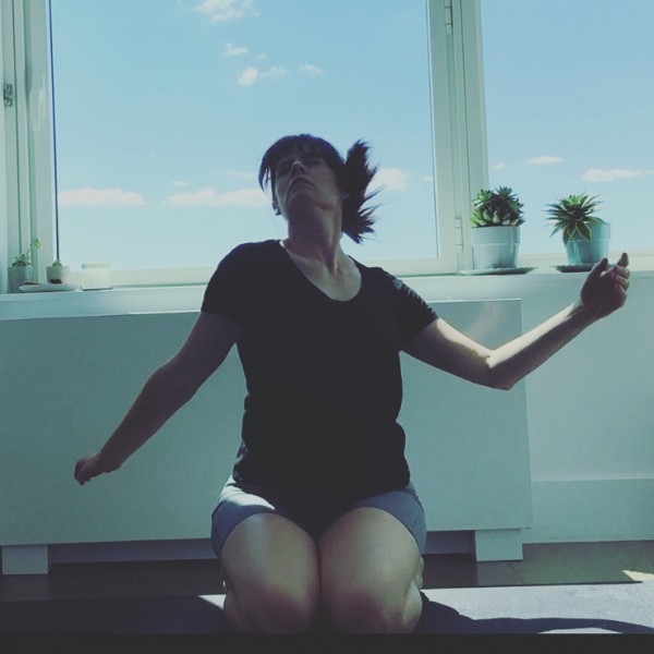 Meredith Glisson, instructor engages in her breathwork practice.