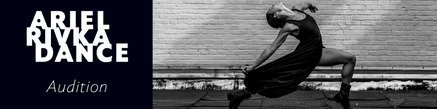 Woman in lunge arching back in a black silk skirt and tank top with black boots