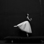 A ballerina en pointe in an arabesque