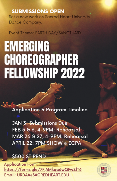 dancer lunging backwards with arms extended forwards with a dark backdrop and stage light peeking through