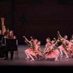 Young dancers in pink costumes perform alongside NYCB's Orchestra.