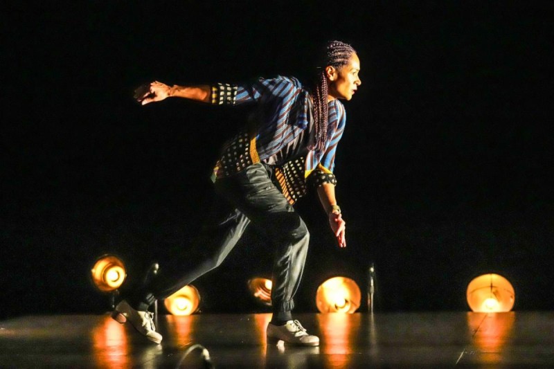 Ayodele Casel performing on stage