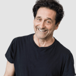 Photo of Billy Siegenfeld in a black shirt on a white background