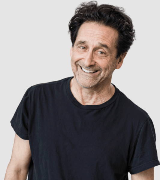 Photo of Billy Siegenfeld in a black shirt on a white background